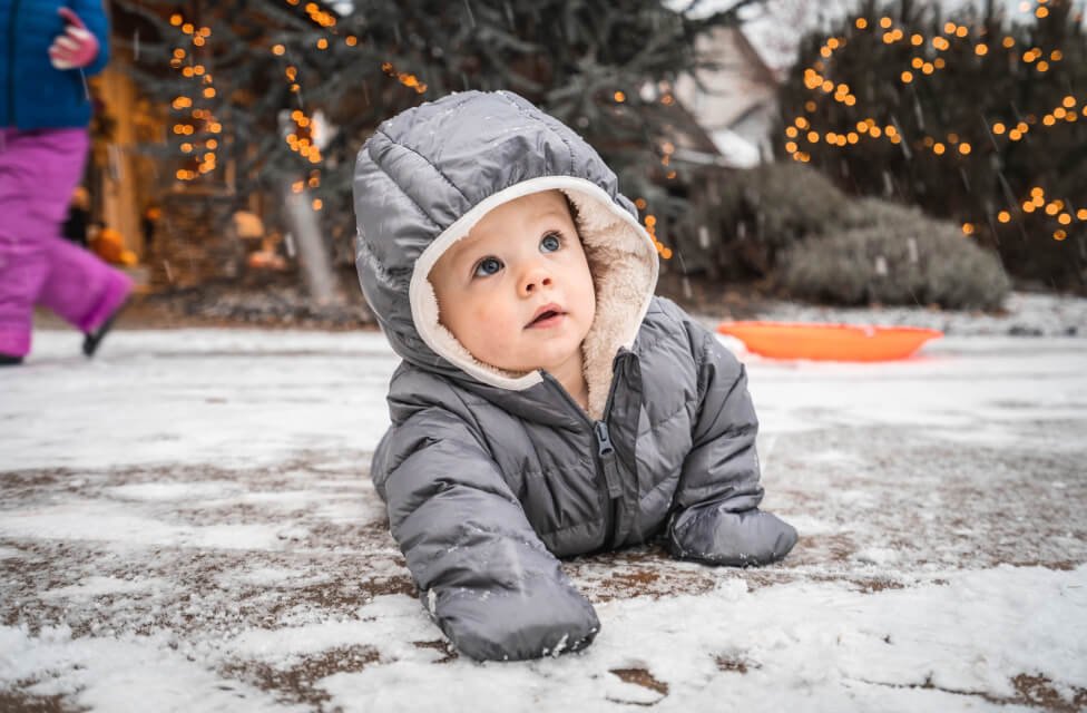 A baby Playing on Snow